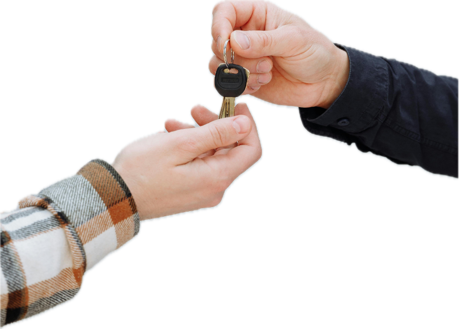 Reaching a financial milestone—keys handed from one person to another